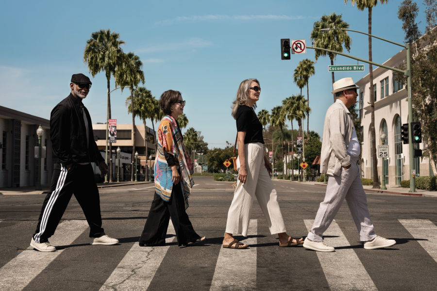 Group of seniors crossing the street together.